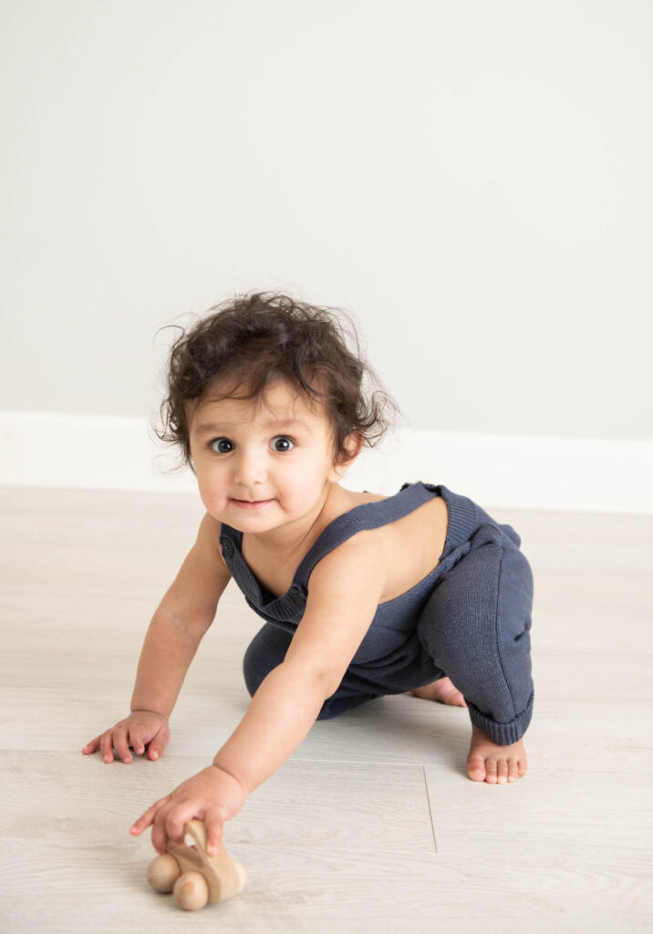 Light and airy photo of baby boy in studio